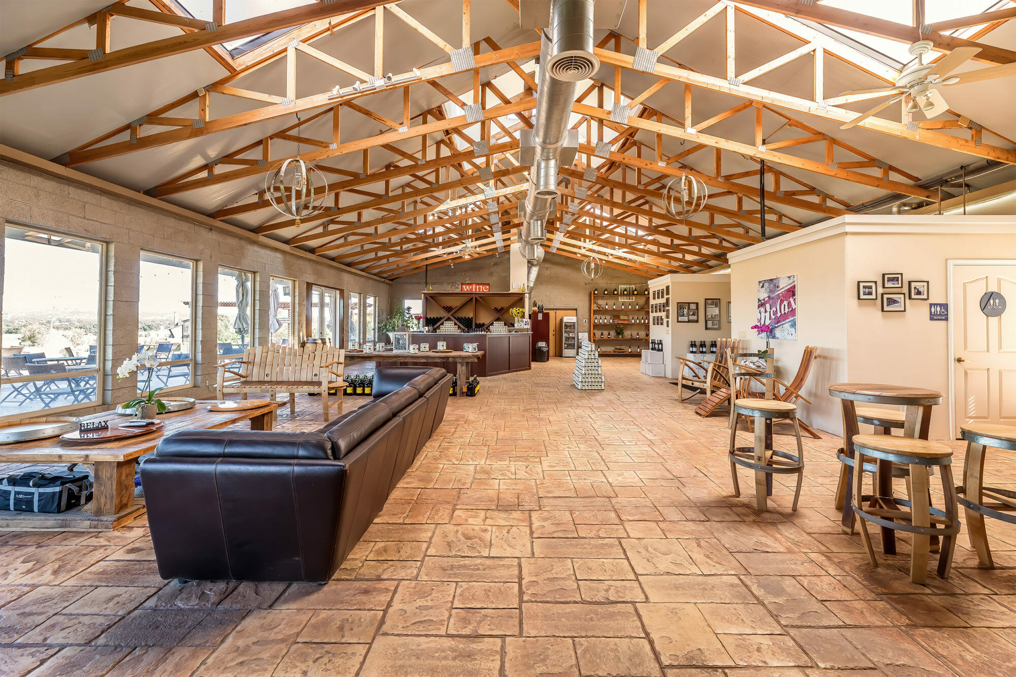 inside of tasting room with exposed vaulted ceiling